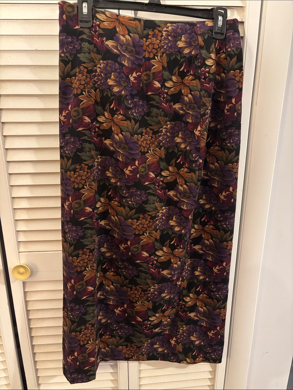 Briggs Size 12 flat front skirt. Black with purple , gold, and burgundy flowers